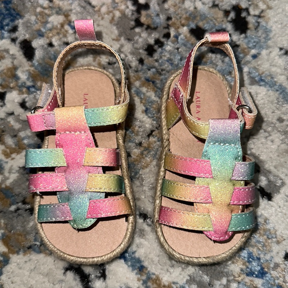 Brand New in Box. Never worn. Laura Ashley Size 4 baby/toddler Sandals.
